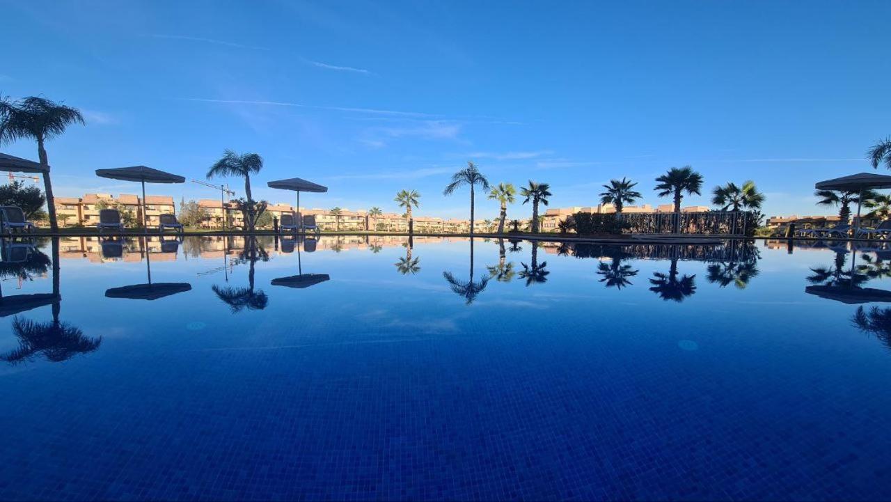 Mini-Villa Situee Dans Une Residence Prestigia A Marrakech, Avec Une Vue Sur La Piscine Et Le Golf Une Securite 24H Sur 24 Et Une Proximite Ideale De L Aeroport 5 Minutes C Est Une Offre Parfaite Pour Des Vacances มาร์ราเกช ภายนอก รูปภาพ